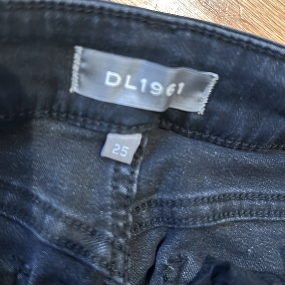 DL 1961 mid rise Insta  sculpt boot cut pre washed black denim jeans. Size 25.